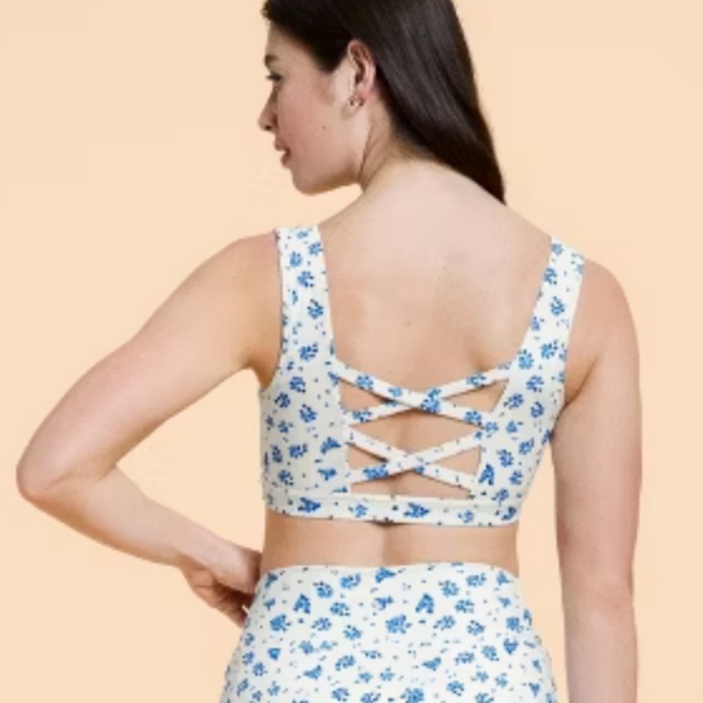 BLOGILATES NWT criss cross sports bra -blue floral -small